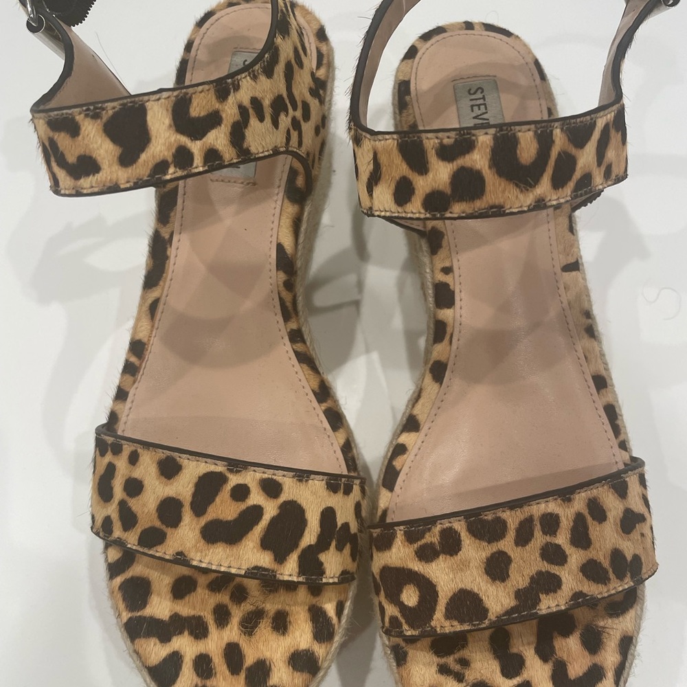 Steve Madden wedged espadrilles with cheetah print.